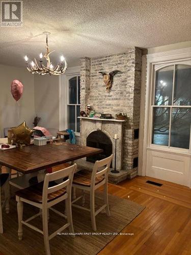 2-4 Division Street, Clarington, ON - Indoor Photo Showing Dining Room With Fireplace