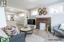 2023 Broder Street, Regina, SK  - Indoor Photo Showing Living Room With Fireplace 