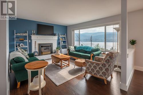 3218 West Bench Drive, Penticton, BC - Indoor Photo Showing Living Room With Fireplace