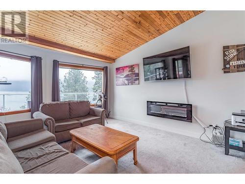 12874 Carrs Landing Road, Lake Country, BC - Indoor Photo Showing Living Room With Fireplace
