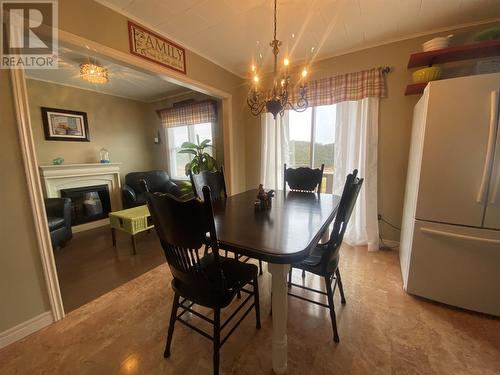 30A Yellow Hill Road, Port Kirwan, NL - Indoor Photo Showing Dining Room With Fireplace