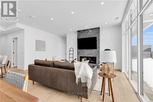 #1001 -480 Callaway Rd, London, ON - Indoor Photo Showing Living Room With Fireplace
