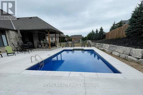 33 Woodside Dr, Brant, ON - Outdoor With In Ground Pool