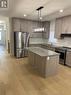 124 Doan Drive, Middlesex Centre, ON  - Indoor Photo Showing Kitchen With Double Sink 