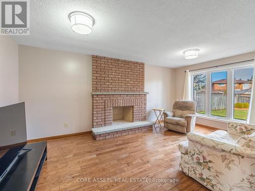 2088 Kempton Park Dr, Mississauga, ON - Indoor Photo Showing Living Room With Fireplace