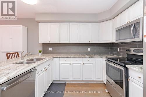 8A Hainer Street, St. Catharines, ON - Indoor Photo Showing Kitchen With Double Sink