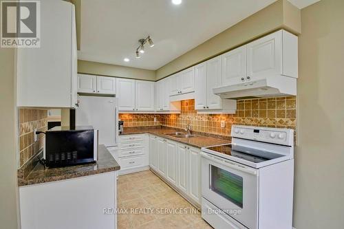 #28 -308 Conway Dr, London, ON - Indoor Photo Showing Kitchen With Double Sink