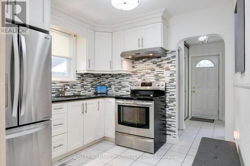 17 Thirty Third St, Toronto, ON - Indoor Photo Showing Kitchen With Stainless Steel Kitchen With Double Sink With Upgraded Kitchen