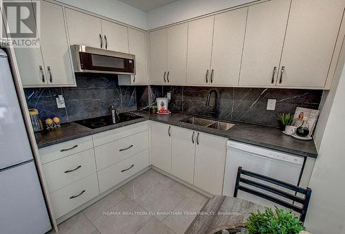 404 - 21 Hillcrest Avenue, Toronto, ON - Indoor Photo Showing Kitchen With Double Sink