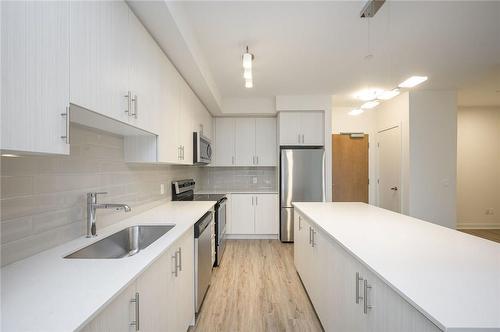 320 Plains Road E|Unit #507, Burlington, ON - Indoor Photo Showing Kitchen With Upgraded Kitchen