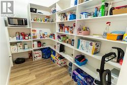 Pantry located off the kitchen. - 