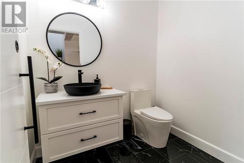 Main floor powder room. - 29 Taylor Heights Drive, Pembroke, ON - Indoor Photo Showing Bathroom