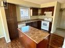 623 Guenter Crescent, Saskatoon, SK  - Indoor Photo Showing Kitchen With Double Sink 