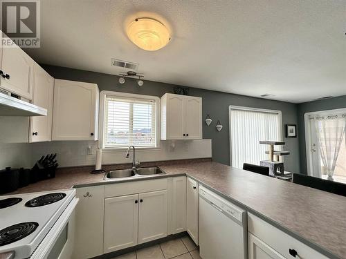 6805 Cottonwood Drive Unit# 208, Osoyoos, BC - Indoor Photo Showing Kitchen With Double Sink