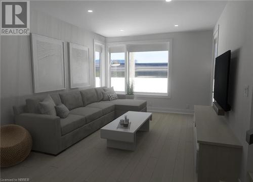 Family room w/in floor heat - 18 Kenreta Drive, North Bay, ON - Indoor Photo Showing Living Room