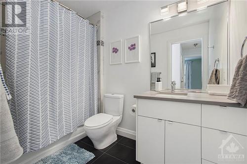 Main bath with large soaker tub and modern touches - 462 Dawson Avenue, Ottawa, ON - Indoor Photo Showing Bathroom