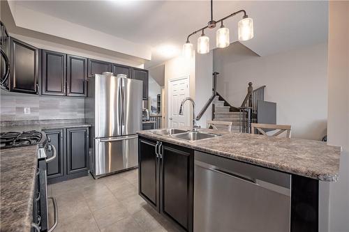 23 Medici Lane, Hamilton, ON - Indoor Photo Showing Kitchen With Stainless Steel Kitchen With Double Sink With Upgraded Kitchen