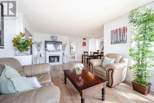 #502 -24 Hanover Rd, Brampton, ON - Indoor Photo Showing Living Room With Fireplace