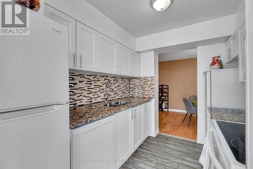 #607 -3077 Weston Rd, Toronto, ON - Indoor Photo Showing Kitchen With Double Sink
