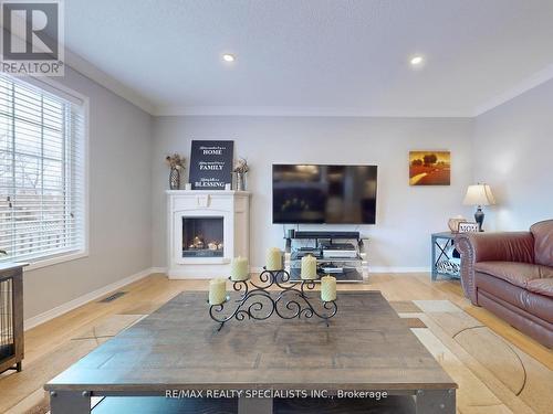 52 Beachpoint Boulevard, Brampton, ON - Indoor Photo Showing Living Room With Fireplace