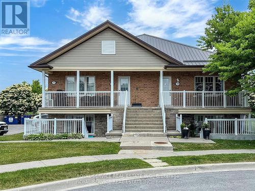 #405 -243 Ruttan Terr, Cobourg, ON - Outdoor With Deck Patio Veranda With Facade