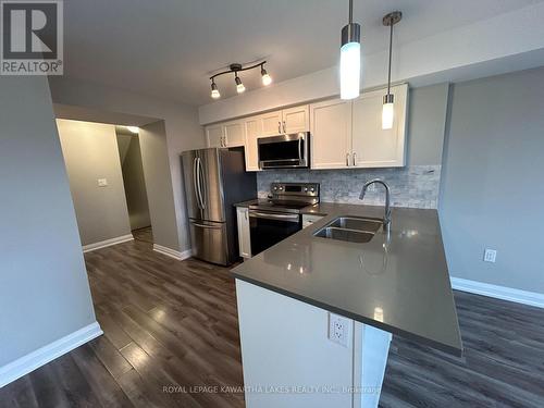 A25 - 350 Fisher Mills Road Road S, Cambridge, ON - Indoor Photo Showing Kitchen With Stainless Steel Kitchen With Double Sink