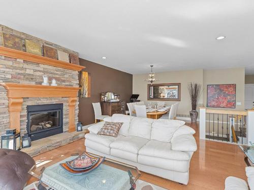 7551 Tronson Road, Vernon, BC - Indoor Photo Showing Living Room With Fireplace