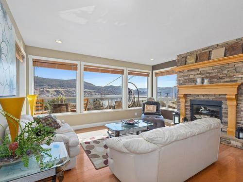7551 Tronson Road, Vernon, BC - Indoor Photo Showing Living Room With Fireplace