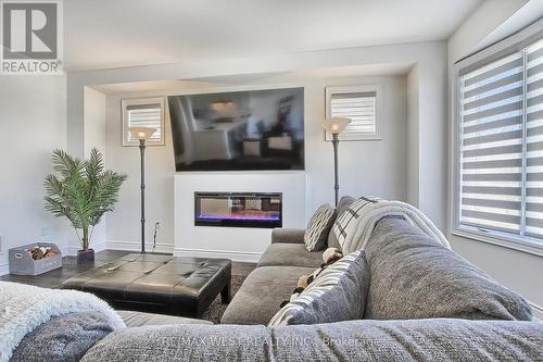 1340 Blackmore St, Innisfil, ON - Indoor Photo Showing Living Room With Fireplace