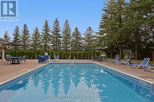 #309 -4 Heritage Way, Kawartha Lakes, ON - Outdoor With In Ground Pool With Backyard