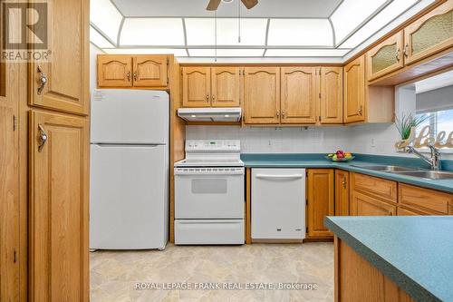 #309 -4 Heritage Way, Kawartha Lakes, ON - Indoor Photo Showing Kitchen With Double Sink
