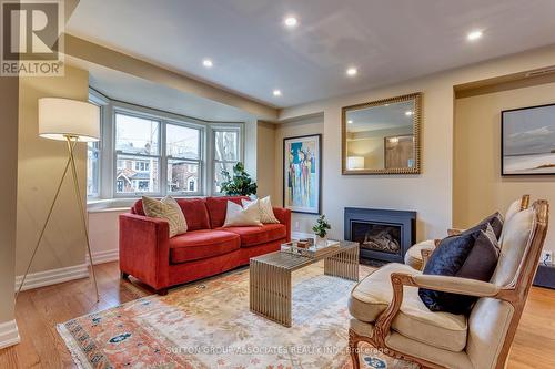 5 Bessborough Dr, Toronto, ON - Indoor Photo Showing Living Room With Fireplace