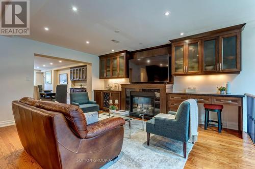 5 Bessborough Dr, Toronto, ON - Indoor Photo Showing Living Room With Fireplace