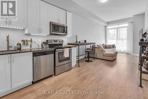#305 -3700 Highway 7 Rd W, Vaughan, ON - Indoor Photo Showing Kitchen With Stainless Steel Kitchen