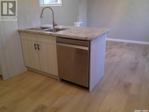 3726 Dewdney Avenue, Regina, SK - Indoor Photo Showing Kitchen With Double Sink