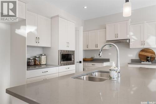 115 Leskiw Lane, Saskatoon, SK - Indoor Photo Showing Kitchen With Double Sink