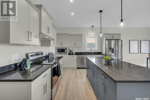 107 Leskiw Lane, Saskatoon, SK - Indoor Photo Showing Kitchen With Upgraded Kitchen