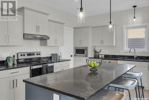 107 Leskiw Lane, Saskatoon, SK - Indoor Photo Showing Kitchen With Upgraded Kitchen