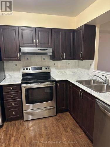#802 -430 Mclevin Ave W, Toronto, ON - Indoor Photo Showing Kitchen With Double Sink