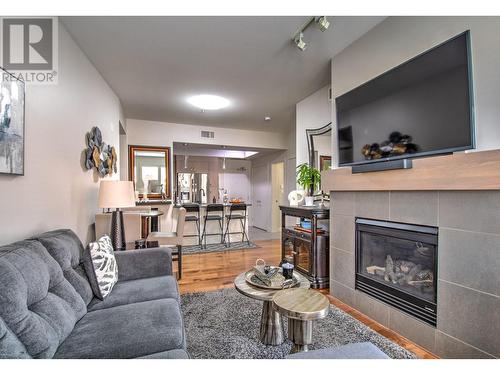 7343 Okanagan Landing Road Unit# 2107, Vernon, BC - Indoor Photo Showing Living Room With Fireplace