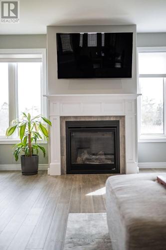 87 Keeler Court, Asphodel-Norwood, ON - Indoor Photo Showing Living Room With Fireplace