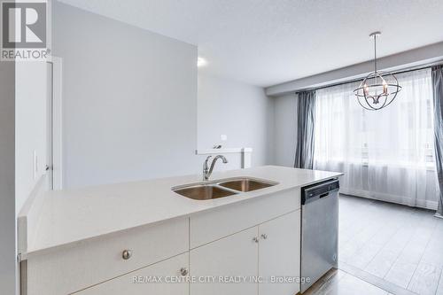 #106 -2070 Meadowgate Blvd, London, ON - Indoor Photo Showing Kitchen With Double Sink