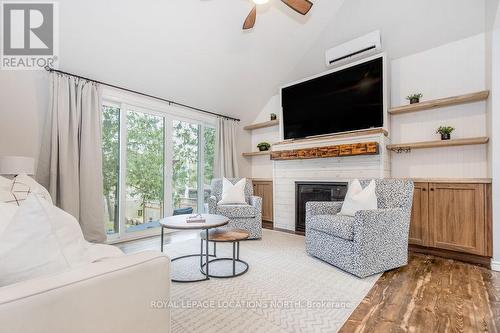 44 Stroud Crescent, Wasaga Beach, ON - Indoor Photo Showing Living Room With Fireplace