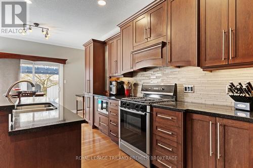 5 Blue Heron Dr, Middlesex Centre, ON - Indoor Photo Showing Kitchen With Double Sink