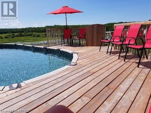 233 Boundary Road, Powassan, ON - Outdoor With Above Ground Pool With Deck Patio Veranda