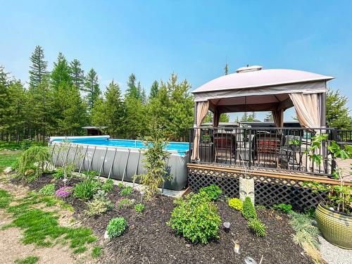 2941 Westview Road, Cranbrook, BC - Outdoor With Above Ground Pool With Deck Patio Veranda With Backyard