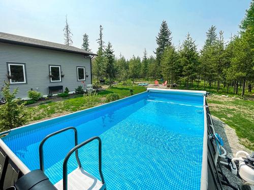 2941 Westview Road, Cranbrook, BC - Outdoor With Above Ground Pool With Backyard