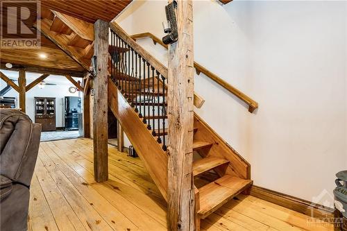 Custom, handmade live edge stairs take you to the upper level. - 5258 Murphy Road, Calabogie, ON - Indoor Photo Showing Other Room