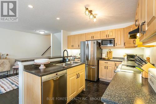 #52 -2145 North Routledge Park, London, ON - Indoor Photo Showing Kitchen With Double Sink