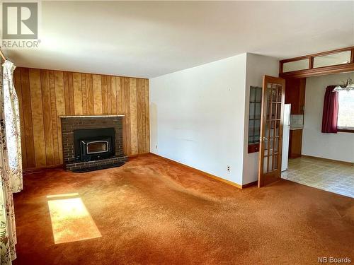 106 Scott Street, Woodstock, NB - Indoor Photo Showing Living Room With Fireplace